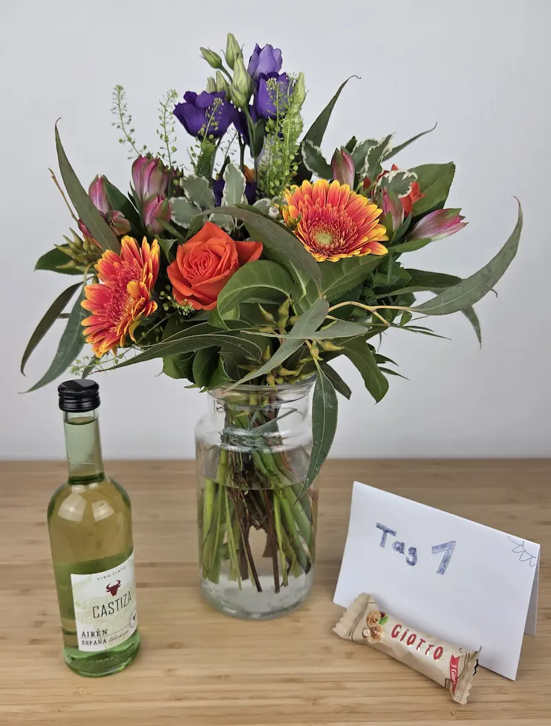 Bluvesa Blumenstrauß aus unserem Testkauf mit gratis Weißwein und Schokolade